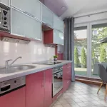 Apartment Grey And Pink Two Bedroom In Cracow With Parking, Desk, Terrace And Jacuzzi Bathtub By Renters