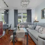 Grey And Pink Two Bedroom In Cracow With Parking, Desk, Terrace And Jacuzzi Bathtub By Renters *