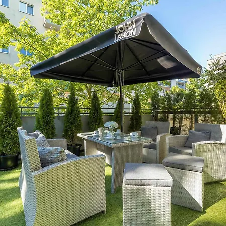 Grey And Pink Two Bedroom In Cracow With Parking, Desk, Terrace And Bathtub By Renters