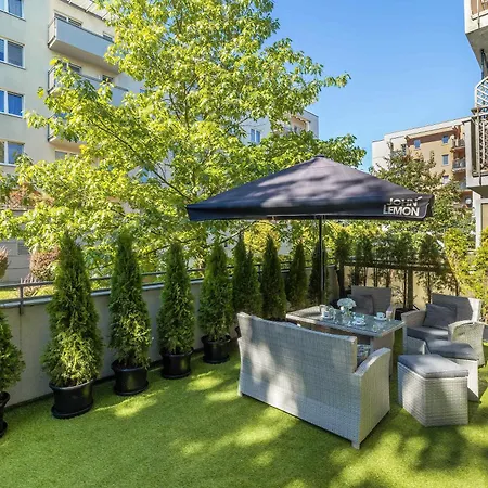 Grey And Pink Two Bedroom In Cracow With Parking, Desk, Terrace And Bathtub By Renters